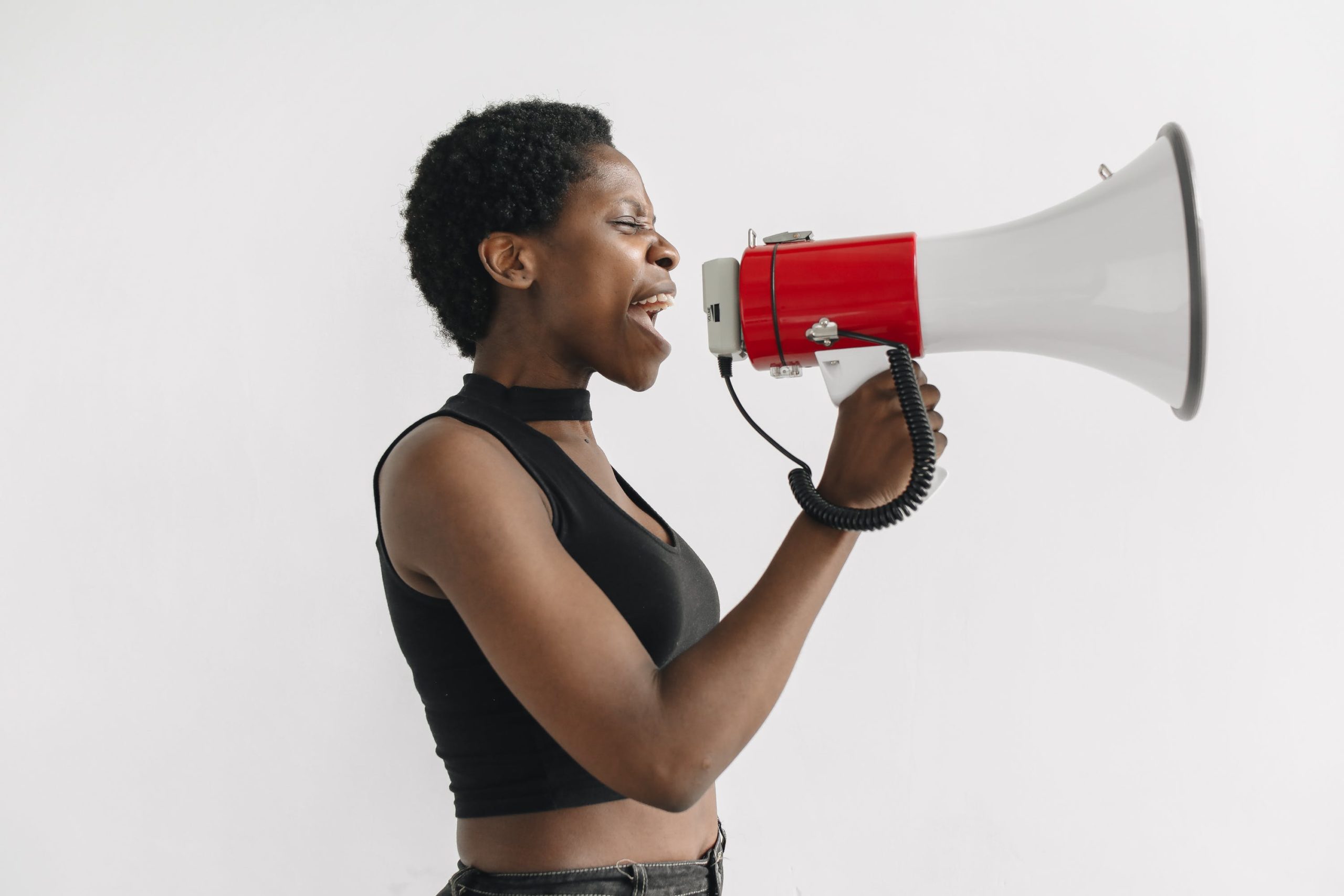 A girl uses a megaphone to clearly communicate